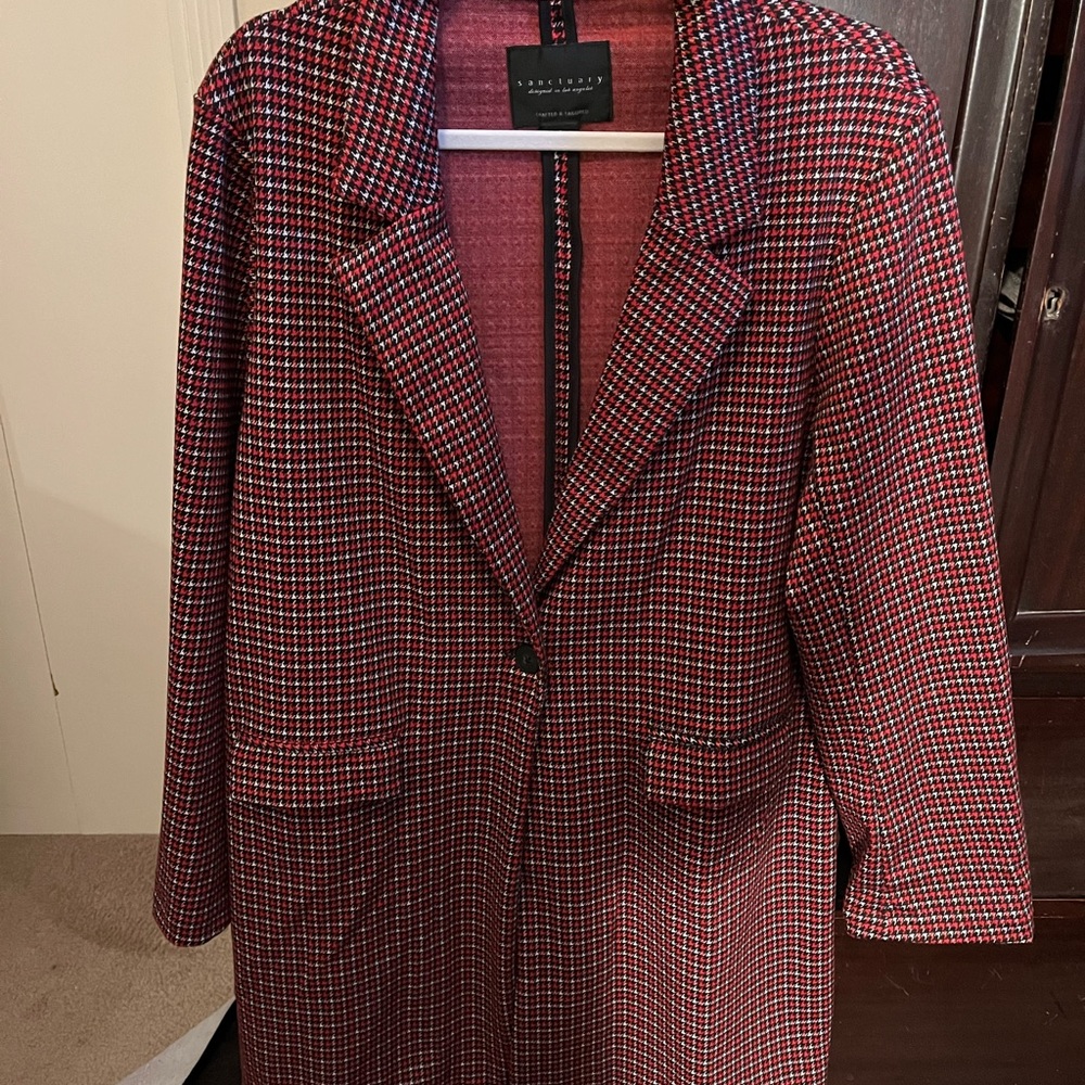 Knee length knit blazer, long sleeves, red, black and white.
